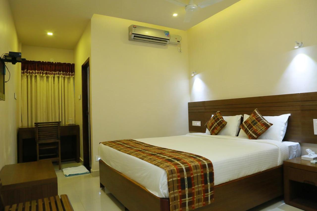 Global Backwater Resort โกลลัม ภายนอก รูปภาพ